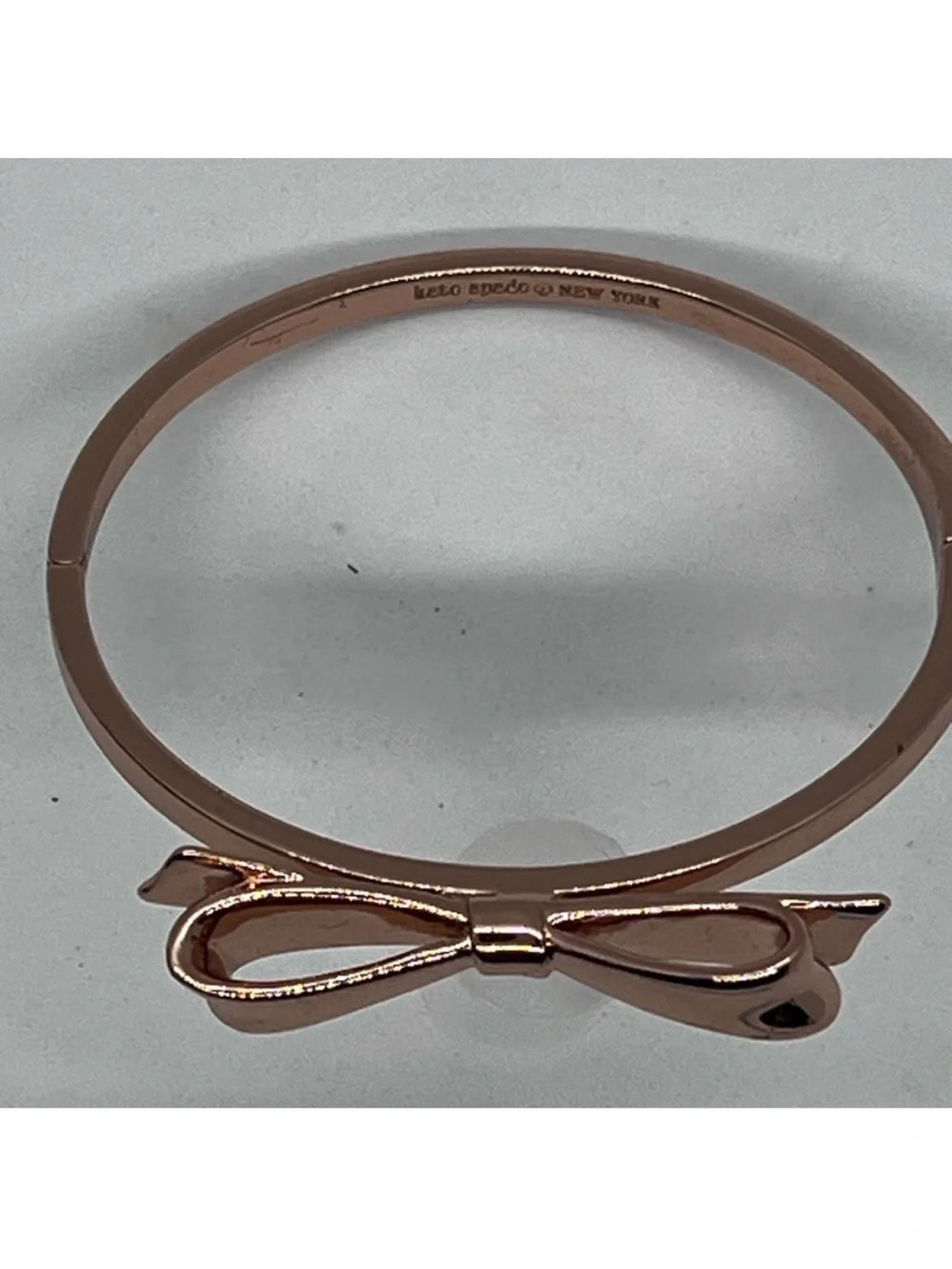 kate spade Rose Gold Bow Bangle Bracelet with dust bag.